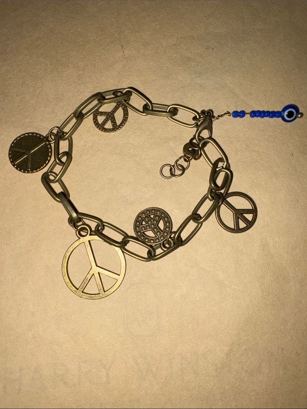 Peace Sign Charm Bracelet in Antique Gold by Sassy Charmer